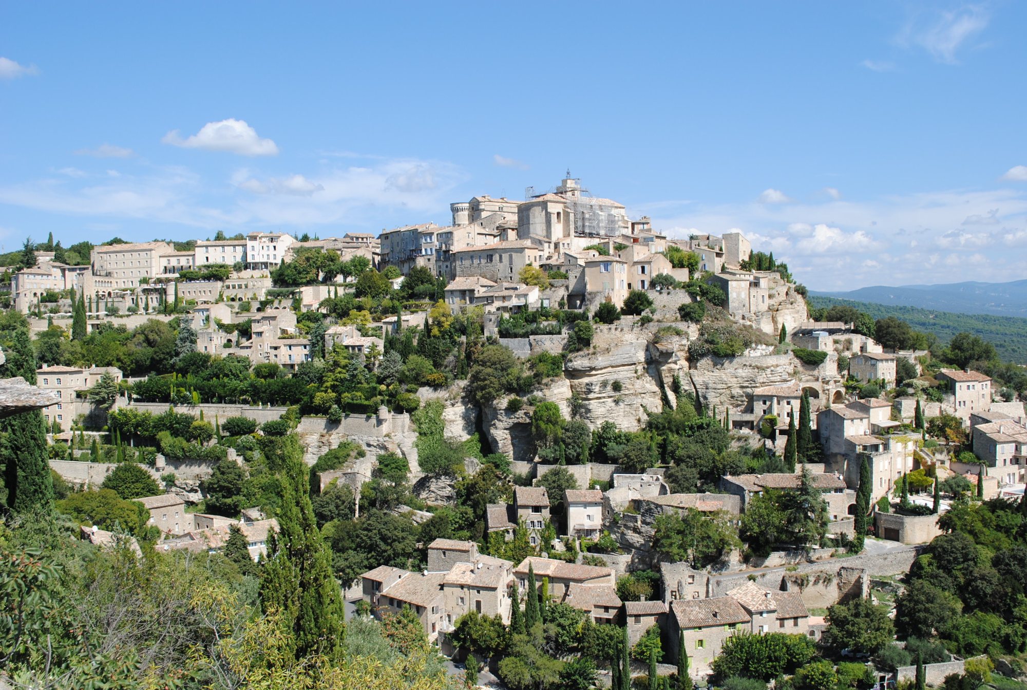 A hilltop village of stone houses.