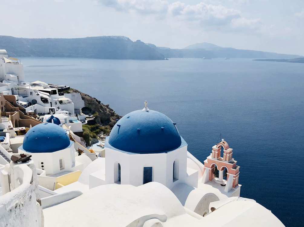 Blue domes of Santorini above the caldera.