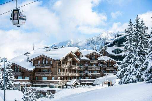 A timber chalet beside the pistes in Courchevel.