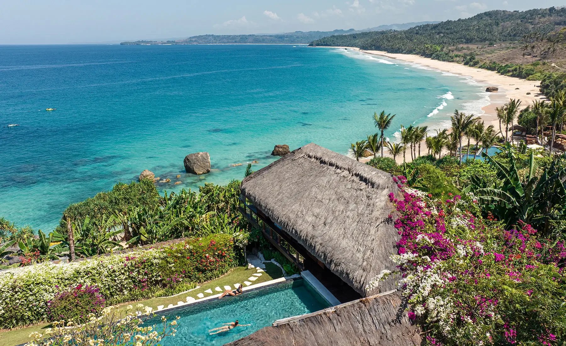 A tropical beach with turquoise water.