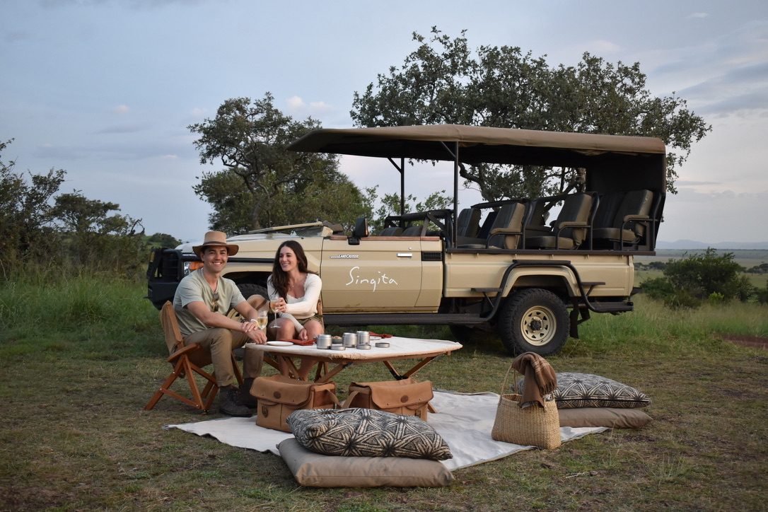 Sundowner by the vehicle.