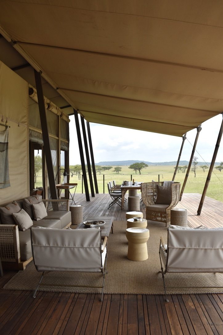 Tented camp lounge with savannah views.